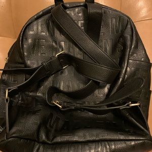 Black - like new Steve Madden Backpack. Many compartments.See more details below
